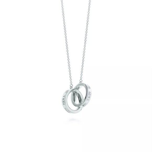 Tiffany & Co. Jewelry - Tiffany & Co. Interlocking Circles Pendant, in silver NWOT